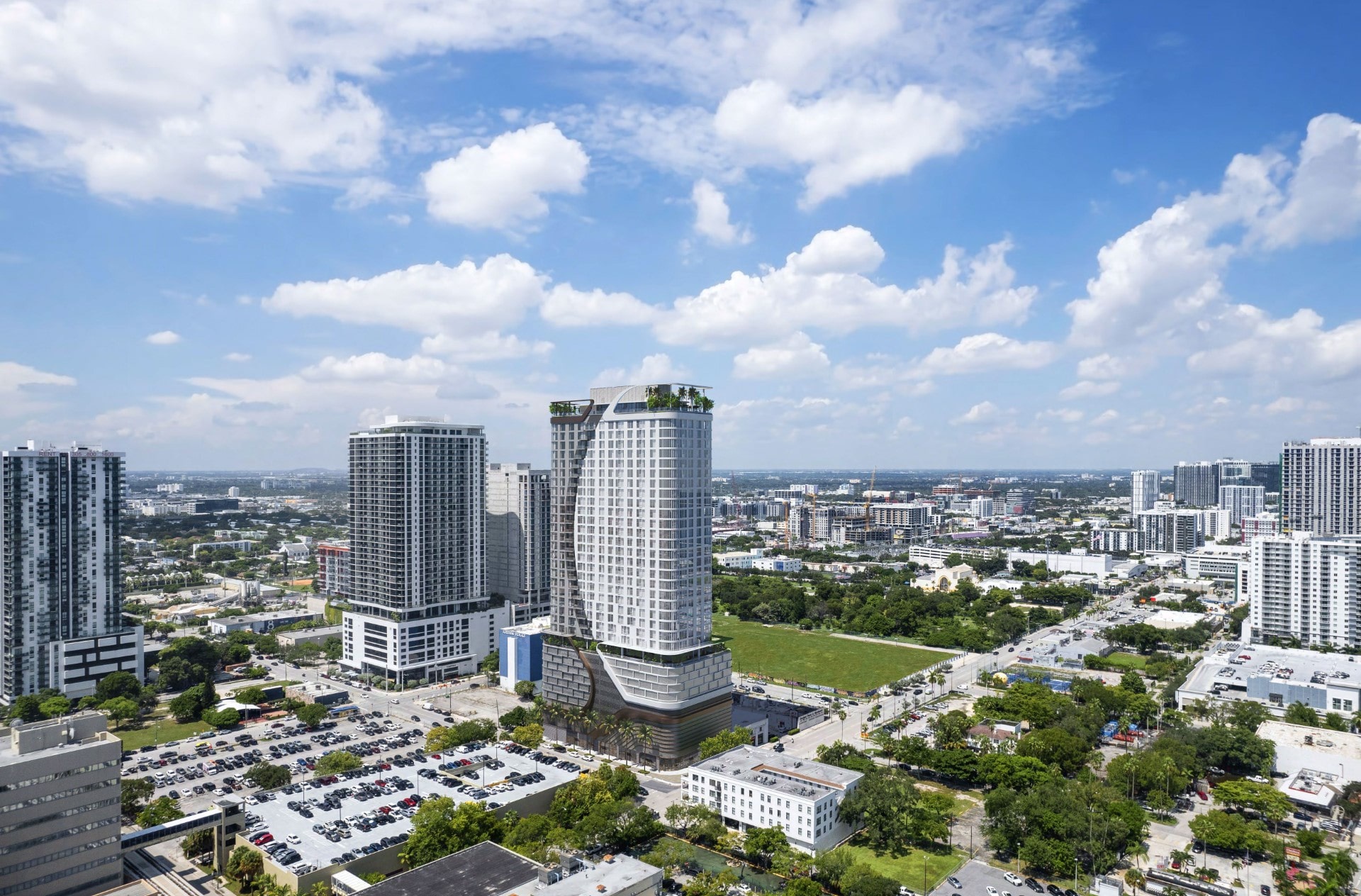 1600 Edgewater tower aerial rendering with Miami skyline and residential neighborhoods