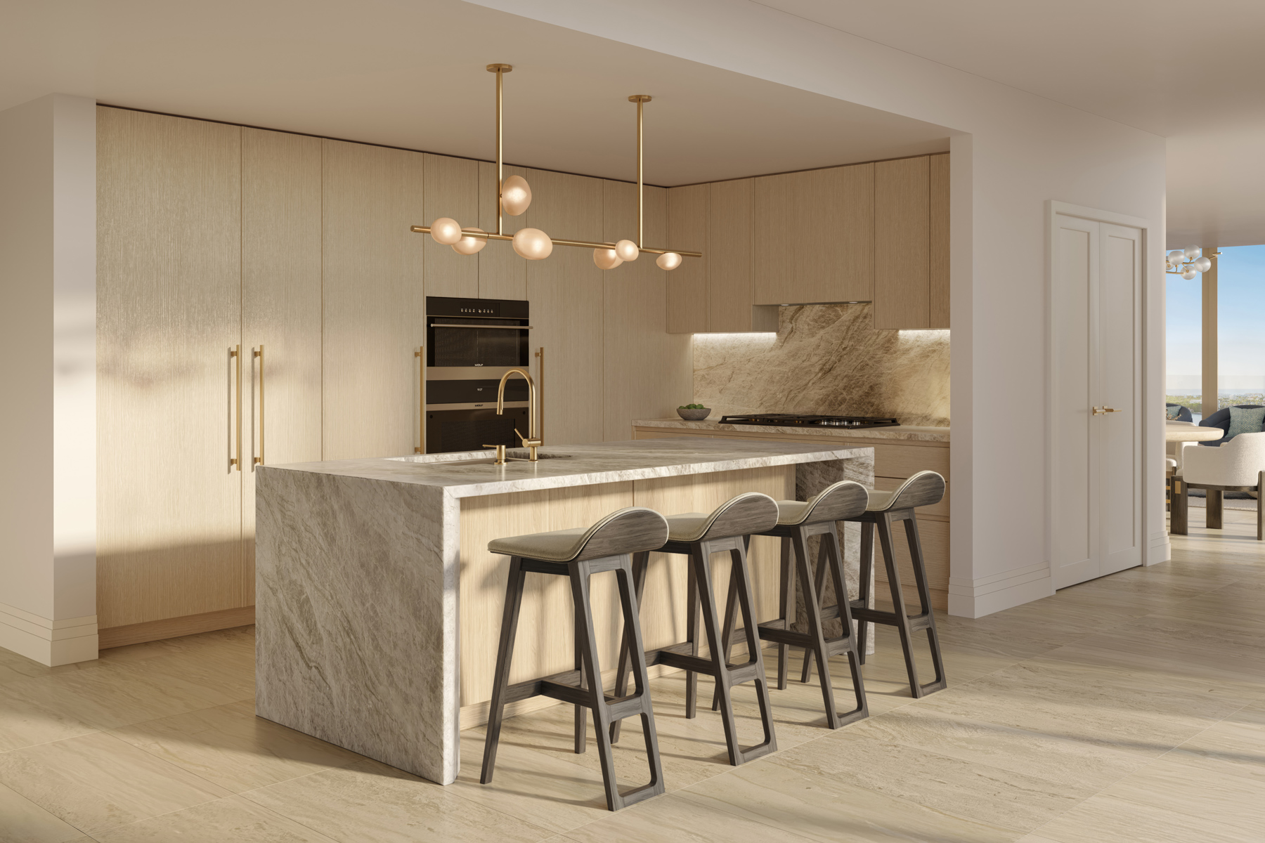 Ritz-Carlton Residences West Palm Beach luxury kitchen with marble island and custom cabinetry